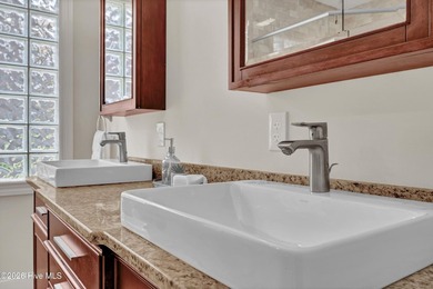 Nestled on a peaceful pond in the gated community of Landfall - photo 34