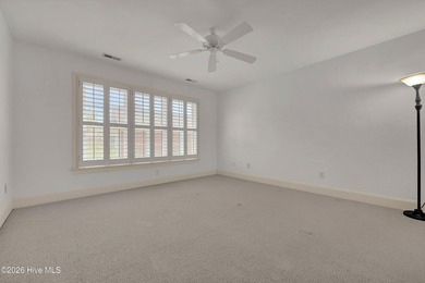 Nestled on a peaceful pond in the gated community of Landfall - photo 36