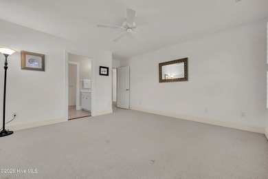 Nestled on a peaceful pond in the gated community of Landfall - photo 37