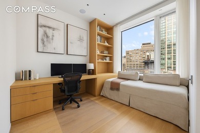 This full-floor, three-bedroom, three-and-a-half-bathroom loft - photo 11