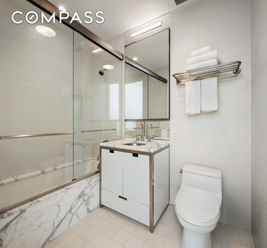 This full-floor, three-bedroom, three-and-a-half-bathroom loft - photo 14