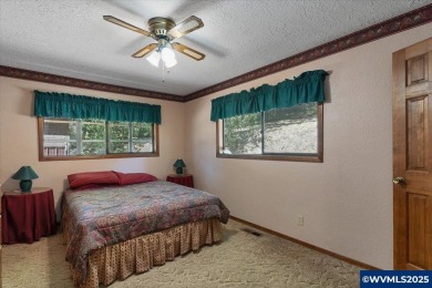 West Salem Hills!  Nestled among lush trees on .63 acre with