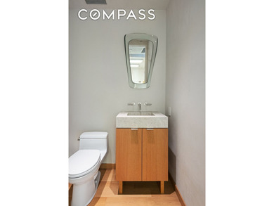 This full-floor, three-bedroom, three-and-a-half-bathroom loft - photo 15