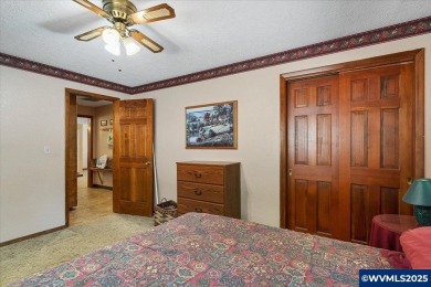 West Salem Hills!  Nestled among lush trees on .63 acre with