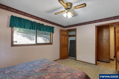 West Salem Hills!  Nestled among lush trees on .63 acre with