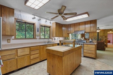 West Salem Hills!  Nestled among lush trees on .63 acre with