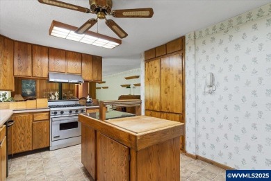 West Salem Hills!  Nestled among lush trees on .63 acre with