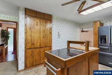 West Salem Hills!  Nestled among lush trees on .63 acre with