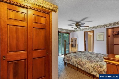 West Salem Hills!  Nestled among lush trees on .63 acre with