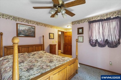 West Salem Hills!  Nestled among lush trees on .63 acre with