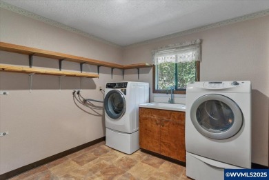 West Salem Hills!  Nestled among lush trees on .63 acre with