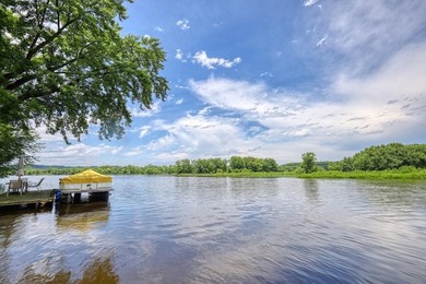 126 feet of frontage on the Wisconsin River! This updated 2 - photo 2