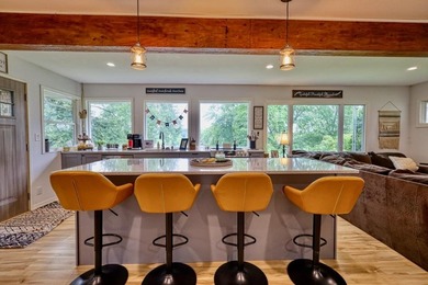 126 feet of frontage on the Wisconsin River! This updated 2 - photo 7
