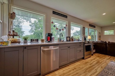 126 feet of frontage on the Wisconsin River! This updated 2 - photo 9