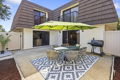Charming 2-bedroom townhouse with both bedrooms featuring - photo 1