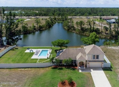 Waterfront Luxury | Double Lot | New Roof | Heated Pool | Canal - photo 1