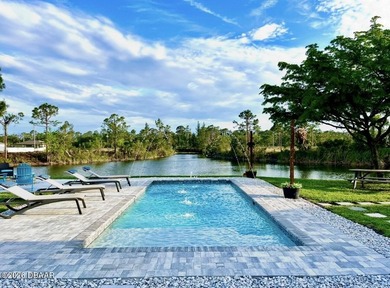 Waterfront Luxury | Double Lot | New Roof | Heated Pool | Canal - photo 3