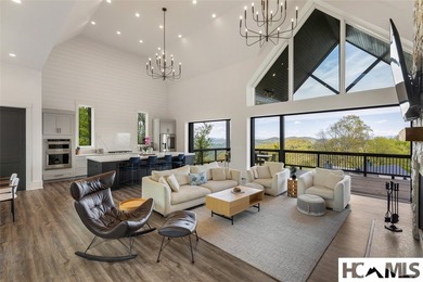 Set within the gated community of Pilots Knob, this thoughtfully - photo 16