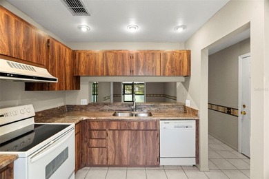 Virtually Staged. Welcome to Bay Oaks Condos! This first-floor - photo 18