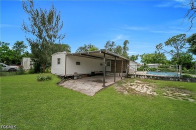 Affordable opportunity in Suncoast Estates! Situated on - photo 1