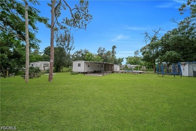 Affordable opportunity in Suncoast Estates! Situated on - photo 2