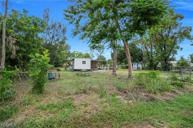Affordable opportunity in Suncoast Estates! Situated on - photo 4