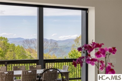 Set within the gated community of Pilots Knob, this thoughtfully - photo 27