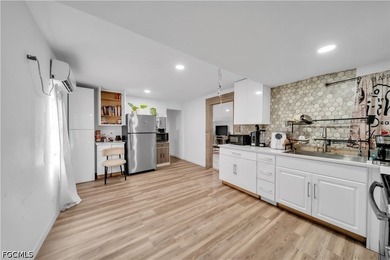 Affordable opportunity in Suncoast Estates! Situated on - photo 8