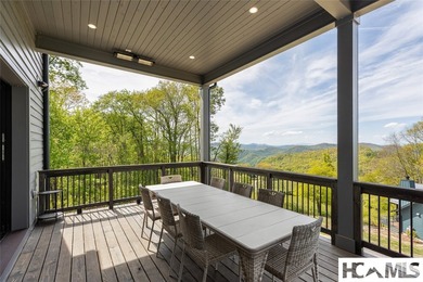 Set within the gated community of Pilots Knob, this thoughtfully - photo 34