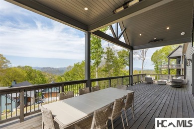 Set within the gated community of Pilots Knob, this thoughtfully - photo 36