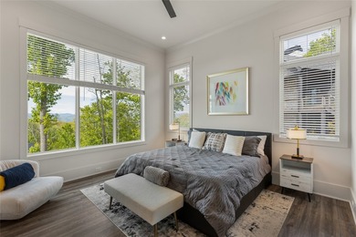 Set within the gated community of Pilots Knob, this thoughtfully - photo 46