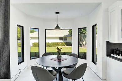 Experience refined South Florida living in this fully renovated - photo 13