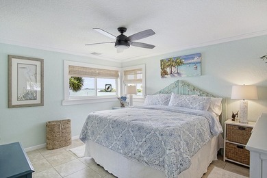 Tucked away just moments from the shoreline, this immaculate - photo 16