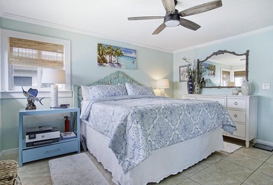 Tucked away just moments from the shoreline, this immaculate - photo 17
