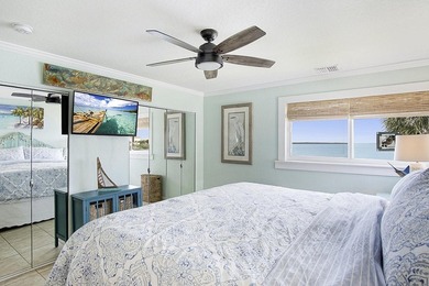 Tucked away just moments from the shoreline, this immaculate - photo 18