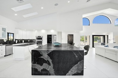 Experience refined South Florida living in this fully renovated - photo 19
