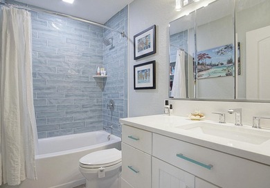 Tucked away just moments from the shoreline, this immaculate - photo 20