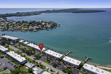 Tucked away just moments from the shoreline, this immaculate - photo 29