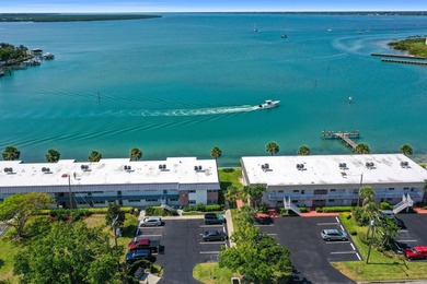 Tucked away just moments from the shoreline, this immaculate - photo 32