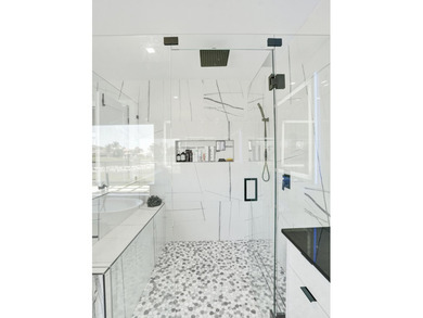 Experience refined South Florida living in this fully renovated - photo 39