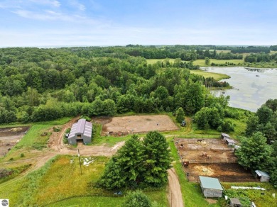 Lake Acreage For Sale in Tustin, Michigan