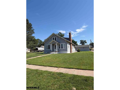 Step into timeless charm with this adorable 1 1/2 story historic - photo 1