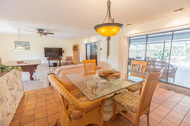 Tropical living awaits in Sandpiper Bay! Situated on an - photo 4