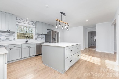 Welcome to nearly 3,000 square feet. This property sits on - photo 5