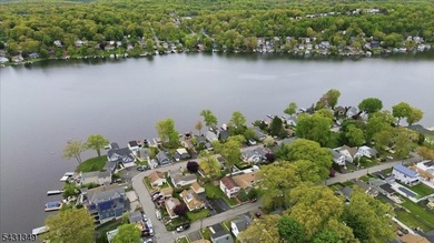 Live the Lake! 4-bedroom, 2-full-bath lake style home is - photo 2