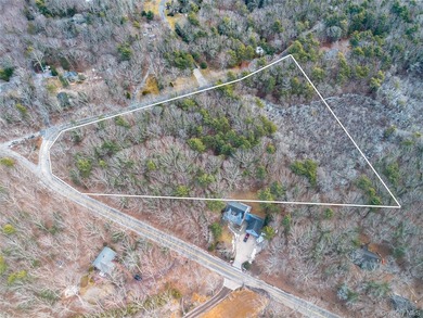 Extremely rare offering of 5.25 acres of undeveloped, wooded - photo 2