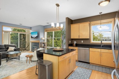 This beautifully updated end-unit condo is filled with natural - photo 8