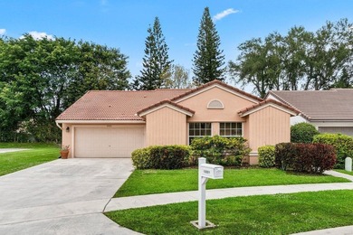 Nestled in the sought after Boca Springs neighborhood, this 3 - photo 1