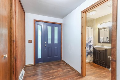 Nestled on two wooded lots just south of Waupaca, this 3BR, 2BA - photo 7