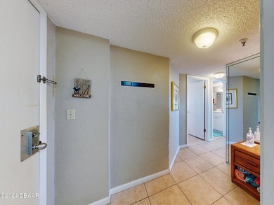 Invest in paradise! 9th-floor condo in Daytona Beach Shores with - photo 3